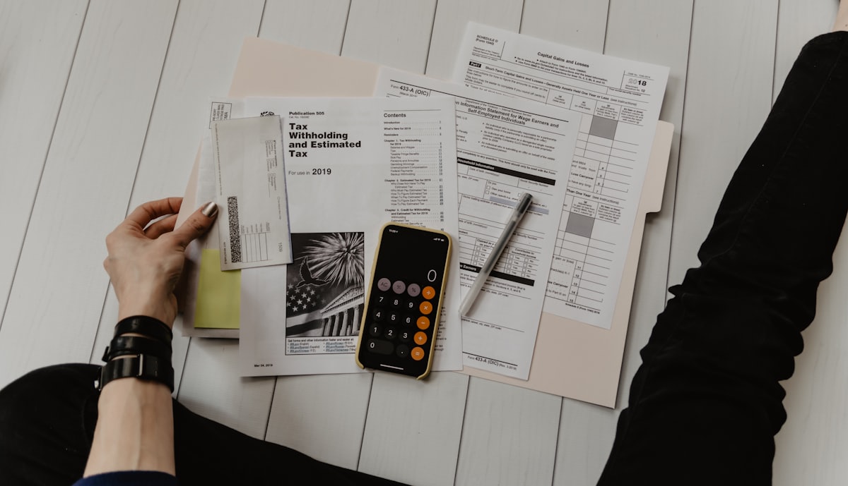 Tax computation with calculator and financial statements